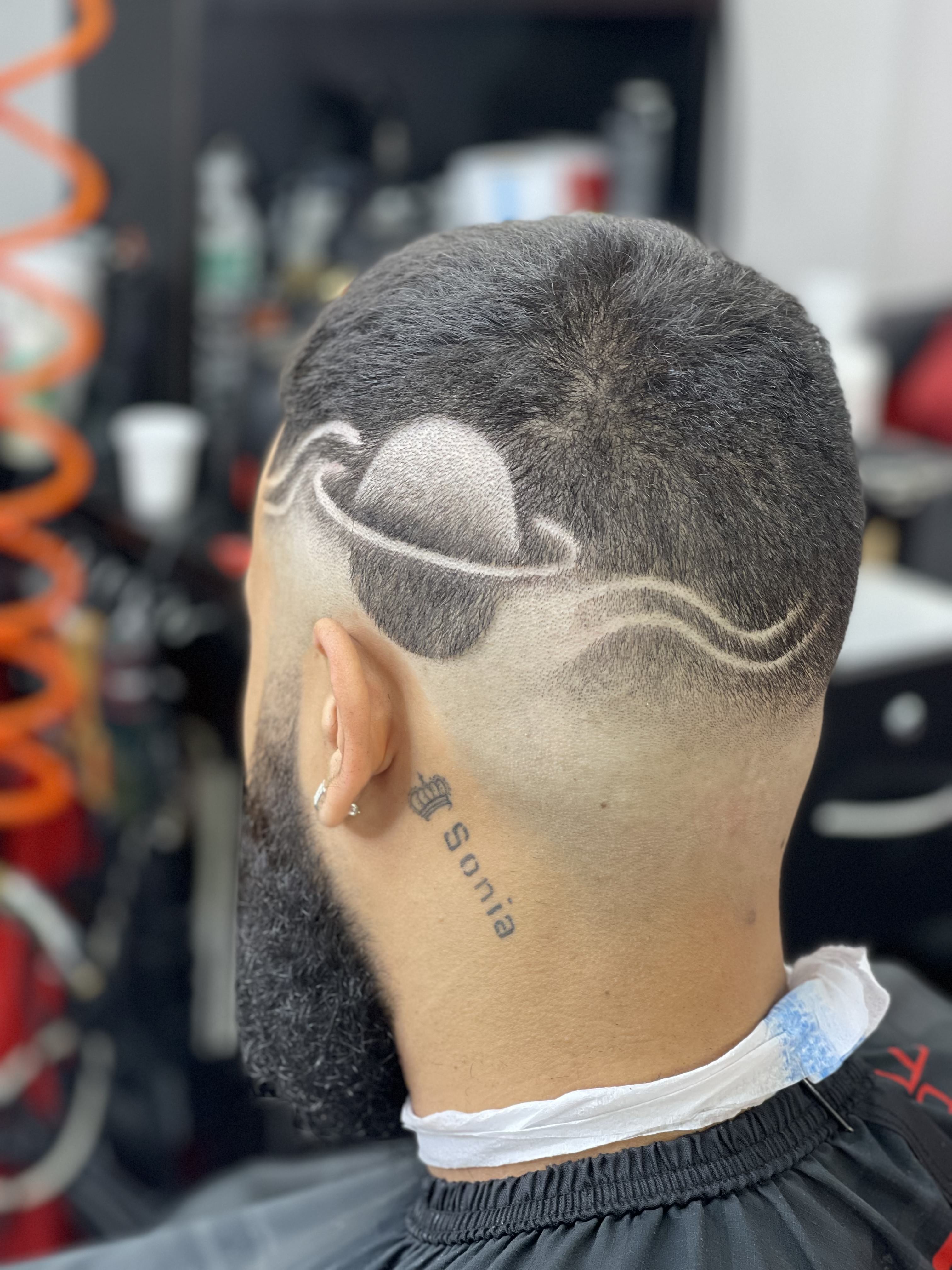 Saturn planet design carved into fade